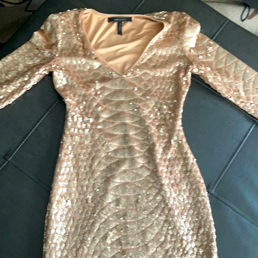 Gold BCBG dress. A great after five dress.